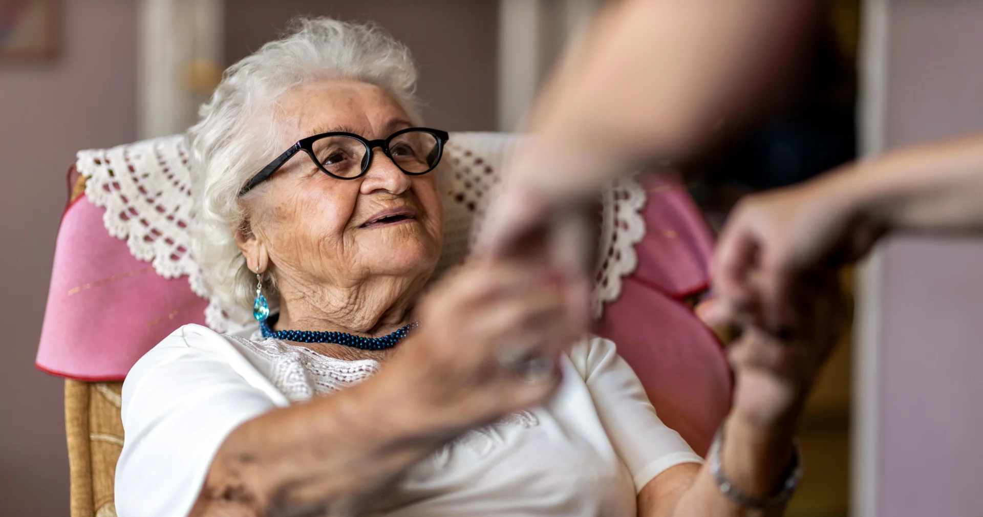 a woman holding a hand in Chicagoland home care